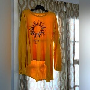 Adorable gently worn long sleeve high low top